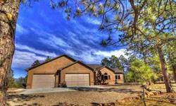 Situated on 35 park-like acres in Santa Fe Trail Ranch. Custom built home boasts bright spacious rooms, upgraded cabinetry, granite counter tops, tile throughout living areas, split floor plan, 9ft ceilings, custom lighting, seasonal pond, over 1,000 sqft