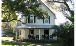Beautifully preserved and restored 2058 sq. ft. 2-story home on an irrigated half-acre located 2 blocks from downtown Dunedin, Florida. Because this is a golf cart community, you are given the option to ride your golf cart or or walk to shops,