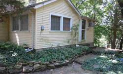 2 bedroom turnkey fully furnished year round cabin includes all furniture and dishes. New water pump in 2008 and new roof in 2011. Concrete septic and owned propane tank. 2 metal sheds, one by river and 2 or 3 docks. View of Mississippi River backwaters,