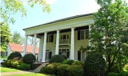 ANTEBELLUM style 5BDRM/4.5BTH home located on Turrentine Ave. in the beautiful historic district of downtown Gadsden. Hardwoods, heavy crown molding, wainscoting, stain glass windows, 4 fireplaces, and working elevator accent the inside of the home. Front