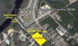 Lot has been recently cleared and is just steps away from Enterprise Landing. The lot is lightly restricted with no POA fees and very close to amenities of Osprey Marina, Waccatee Zoo, Heron Point Golf Club, Socastee Recreation Park, SurfSide Beach