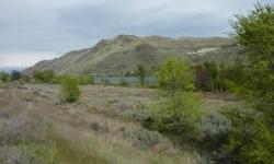 A remarkable piece of undeveloped acreage on the Columbia River. 7.21 acres with approx. 1300 feet of river frontage. No to very low bank. 12 Lot Preliminary Plat approval has been granted by Chelan County. Preliminary Plat No. 2008-010. Utilities are