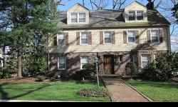Elite Realtors of New Jersey Jacqueline Denk- Large center hall colonial with terrific entertainment flow. Comes with beautiful architectural detail, central air & winter views of the city. Some carpet covering beautiful ribbon hardwood floors on first