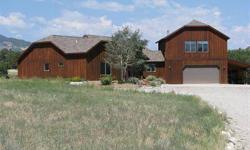 This architecturally designed home sits on 1.95 acres on a cul de sac in the foothills of the beautiful Sangre de Cristo Mountains. The home features 3 bedrooms, 3 baths, and fantastic mountain and valley views from every window. The rooms are spacious