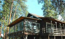 What a Deal! Completely renovated cottage on Methow River, with stunning setting looking right at the water and tall Fir and Pine with meadows. Super easy access from Winthrop on a paved road. Intimate river setting. Great Room features wrap-around