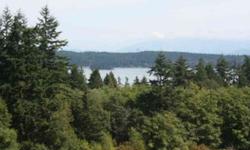 Cust Blt View Hm w incredible sunrise tucked away on 1.48 ac @ end of long driveway w/park-like setting. Privacy/gardens/trees w/birds & wildlife 4 neighbors. View-Skagit Bay & Cascades. Front Community acreage protects view. 3 deck/balconies, 3 car
