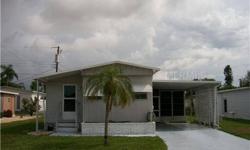 This roomy single wide home has a large Living Room Dining Area. Home features a sizable master bedroom. The bathroom is one of a kind with lots of cabinet and counter space. You will love the huge, air conditioned Lanai. A great place to enjoyFlorida