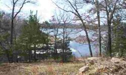 overlooking quiet cove. 1.28 acres M/L. Close to lake & dock area. 25 minutes to Mountain Home.Listing originally posted at http