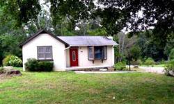 Cute 2BR/1BA, screen porch, out building & close to town without city taxes. Almost 3/4 acre, nice back yard for garden. Come see, very reasonably priced, motivated seller.Listing originally posted at http