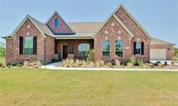 ENERGY STAR CERTIFIED SINGLE STORY CUSTOM HOME! 4 BEDS, 3 BATHS OVERISIZED 4 CAR GARAGE 1.51 treed acres backing to a greenbelt in one of Rockwalls best kept secrets! Grand Foyer, Large formal study, Custom antiqued fixtures, Top of the line kitchen,Huge