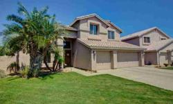 Upgrades galore in this Ocotillo waterfront home. Plantation shutters, ceiling fans, fireplace, corian counter tops and deck off master bedroom. Diagonal laid travertine stone has inlaid decorator tile in various locations. Master bedroom suite has an