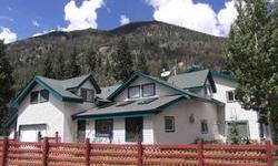 PRICE REDUCED - River Front Property. Only 15 minutes away from Silverthorne and Summit County skiing and easy access to Denver or DIA. 6 bedroom, 8 bath home on Clear Creek with gorgeous creek and mountain views. Trout fishing out your back door. Slate,