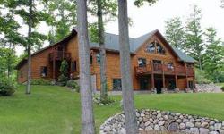 Gorgeous Up-North log home, never lived in, new construction, perfect for full time residence or luxurious cottage. High end finishes include wood flooring, granite, slate, tile, stainless appliances, Kohler fixtures and Kolbe and Kolbe windows. 3+car