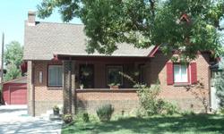 1930 brick Tudor in Corey-Merrill neighborhood with open space front view, covered front porch, private fenced in backyard with deck and patio. 5-piece master bath with jetted tub. Second main floor bedroom features full bath, sitting room/study area.