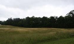 Nice track of land mostly cleard grass field with approx. 1 acre of woods in back. great building site, pasture, garden. some restrictions