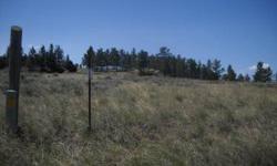 20 acres with access from a paved state highway! Montana land for sale. Mature pine trees, awesome rock formations, big views. Easy financing options available. LEGAL DESCRIPTION