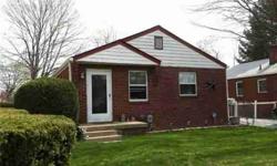 Move-In-Ready brick bungalow in popular Warren Township. Newer carpet in Great Room & bedrooms, laminate in Kitchen. Stove & refrigerator included. Very clean, partially finished basement with half bath is perfect for a Den or Family Room. Ceramic tile in