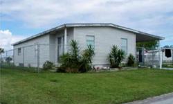 This lovely mobile home is located in the wonderful community of Barefoot Bay. Great location near community pool, club house, golf course, park, and is near many other community recreational opportunities. Less than two miles from the ocean! Whether you