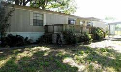 WATER FRONT GATED COMMUNITY. HOME HAS BEEN NEWLY REMODELED- 2 BEDROOMS, 2 BATHROOMS. KITCHEN HAS PLENTY OF CABINET SPACE, SPACIOUS LIVING AREA , NEW FLOORS, CARPET AND PAINT THRU OUT. 2 CARPORTS 22 X 16 AND 26 X 12, LARGE 14 X 13 WORKSHOP WITH POWER,