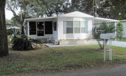 14 X 50 Mobile home with land. 2 Bdrm, 1 bathrm, Livingroom, kitchen, Florida room with new vinyl windows, carport & lg shed. Cathedral ceilings in LR. Eat in kitchen has lots of cupboards & counter space. Fully furnished including frig, stove, washer,
