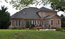CUSTOM All Brick & Stone House located in Cabarrus Co w/ Great Schools & Taxes & in Pool/Tennis Comm close to I-85/485. Well Maintained, Soaring Ceilings, Impressive Moldings/Trim, Extensive Wood Fls. Gourmet Kitchen w/ Granite, Tile, SS Appliances,