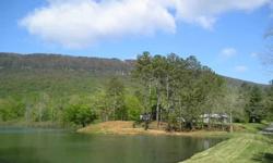 GORGEOUS80 ACRES WITH 12 ACRE SPRING FED LAKE-BREATH TAKING VIEWS OF HOODS OVERLOOK -HANG GLIDING LAUNCH FROM PIDGEON WILDLIFE RESERVE (18,000 ACRES) YEAR ROUND SPRINGS AND FLOWING CREEK -Listing originally posted at http