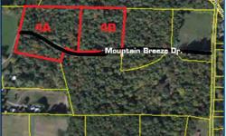 Land can be split into 2 5-acre tracts or sold as a whole. 1 tract has Mountain Breeze Dr running through it placing about 1/4 of the property on the other side of the road. This Lot has creek Through it on the other side of the road.