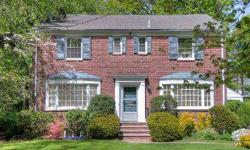 Spacious and beautiful, brightly sunlit center hall colonial located on a quiet, tree-lined residential street has tons of curb appeal. New furnace, updated electrical, new chimney liner, and more! Near the Village, NYC transportation, town pool, library,