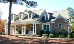 Exquisitely finished and beautifully appointed, this stately executive retreat built by Bundy Construction boasts light and bright interior with windows galore; gleaming hardwoods in floyer, living room, dining room, kitchen, nook and family room; 10'