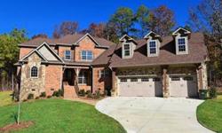 Gorgeous custom new contstruction. Loaded with custom finishes. Backs to woods; plenty of privacy. HUGE bonus/media room with wet bar; Master on main; fireplaces in great room and kitchen "keeping room". Really lovely. Must see to appreciate.Listing