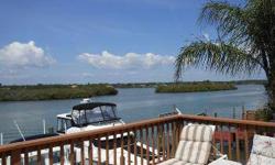 Spotless waterfront 2 bedroom home with detached guest suite including 3rd bedroom, living room and bath. All new hurricane rated windows & doors, beautiful open patio deck facing intracoastal/natural bird sanctuary, 10,000 lb boat lift, large concrete