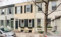 This is an adorable and charming 2 bed/1 bath Fitler Square home with original brick front with shutters and original refinished hardwood floors through-out! Located on one of Fitler Squares finest tree lined blocks!! Vestibule with french door leads into
