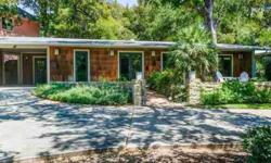 Central Austin modern ranch! Remodeled 1950's ranch style home nestled on mature, shaded lot in highly desirable Rosedale. Design by architect Heather McKinney. Beautifully modern open floorplan, many updates throughout home, stained concrete floors and a