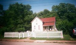 1 Acre farm house in down town Brazil IN, sits on a 1 Acre wooded lot. All new plumbing, new 200 amp electrical service,new maple flooring in kitchen, newly decorated, approx 2400 sq.ft. just needs some finishing touches. We are moving out of state and
