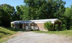 Doublewide trailer on 1.6 acres- creek to rear. As-is, no warranties.
Listing originally posted at http