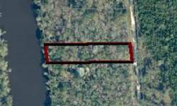 River Lot on the Suwannee River. Close to Charles Springs park and boat ramp. Owner will consider owner fiancing - $40000, 15yr fixed - 8% interest --Owner will not allow early payoff payment if owner financed.. Pole Barn, Travel Tailer, Shed, and Metal