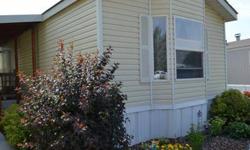 THIS IS A METICULOUSLY CARE FOR MANUFACTURED HOME THAT IS CLEAN, CLEAN, CLEAN AND WAY CUTE IN AN OVER 55 COMMUNITY!! COME AND SEE THIS ADORABLE 3 BEDROOM 2 BATHROOM BEAUTY! MASTER BATHROOM HAS A CORNER GARDEN TUB WITH SEPARATE SHOWER WITH A LARGE WALK IN