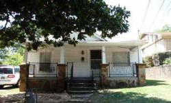 WHAT A CUTIE! This charming little home was build in 1930 (per appraiser) and offers 937 sq feet of living area with two bedrooms, one bath and two living areas. The recent updates include fresh paint thru out, new vinyl and carpet floor coverins, new