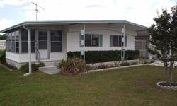 PRICE REDUCED on this wonderful furnished 2 bedroom/2 bath double-wide mobile home in Zephyr Shores, one of Zephyrhills, Florida's more popular mobile subdivisons. This is not a rental park. You own the land under the home here. And even better, the lots