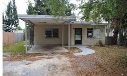Opportunity awaits! 2 bedroom 1 bungalow with attached carport. Nice yard, close to public transportation, schools and shopping...endless possibilities for your finishing touches. Investors Dream! This is a Fannie Mae HomePath property. Purchase this