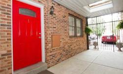 Beautiful 2BD/2BA townhouse style condo with 1-deeded parking space and common courtyard! This home features a wide open living/dining room area with wood floors, many windows, gas burning fireplace with wood mantle and a built in flat screen T.V. with