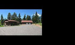 A spectacular rural setting North of White Salmon is where you?ll find this custom home. Granite counters, vaulted wood ceilings, large master with spacious master bath. Two bedroom suites down with separate baths. Oversized shop/garage with it's own full