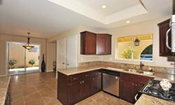 Welcome home to this gorgeous, single-story in a charming neighborhood in Camarillo. The kitchen and baths have been completely remodeled with granite counters and stone tiles. There are two large living spaces for you to enjoy, both with over-sized