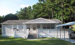 Large 2 BR 2 BA DBL wide manufactured home in Windjammer Village, a family community with clubhouse and pool. Located in Garden City just south of Myrtle Beach, SC. Home is approx a 1 mile golf cart ride away from the beach & Garden City fishing pier.