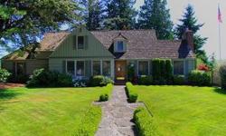 Stunning Craftsman on 5/8 acre city lot. 4 bedrooms w/office, 2.5 baths. Extensive remodel in '99 keeping all the charm and warmth intended in its original construction. Updated kitchen w/breakfast nook & adjoined dining room. Wide plank hard wood