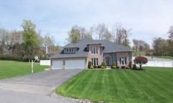 This brilliant 5-bedroom two-story home highlights exquisite luxury.Incorporating a brickvinyl exterior this property includes hardwood,tile & carpet flooring,vaulted 2 story foyer,oak trim & earth-tone colors thru-out.Covered concrete deck leading