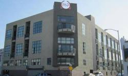 Good size SOMA top floor loft features hardwood floors, modern kitchen, 2 baths, and deck with partial city views. Unit comes with 1 car parking (#20) and storage (#7). New carpet and paint, move-in condition!Listing originally posted at http