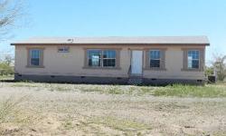 Great HUD Manufactured Home! Country living on 1 plus acre of land. Great floor plan with lots of light. A spacious kitchen with lots of cabinets. The Master bathroom is huge! Buyers will be financially responsible for dewinterization/rewinterization fees