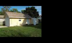 Single or two family home. Large yard, built-in hutch, walking distance to park, grocery store and Lake Michigan. Small shed on back of garage. Enclosed front porch.Listing originally posted at http