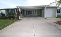 NEWER MANUFACTURED HOME IN PREMIER COMMUNITY OF TANGLEWOOD. THREE BEDROOM, 2 BATH POPULAR FLOORPLAN WITH EXTRA LIVING ON GLASSED- IN AND AIR CONDITIONED FRONT PORCH. LARGE EAT-IN KITCHEN PLUS A GOOD SIZED FORMAL DINING ROOM, LARGE MASTER BEDROOM AND BATH,